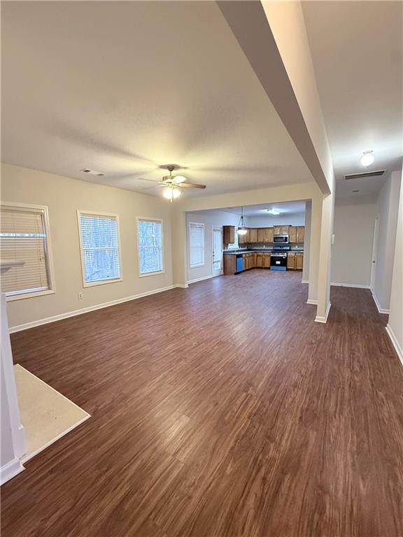 82 Kennedy Court Hiram, GA 30141 - Photo 10 of 26 a view of a livingroom with wooden floor and furniture