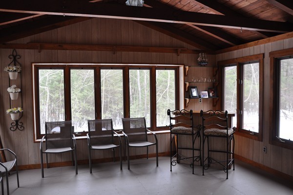 204 Fitchburg Road Townsend, MA 01469 - Photo 11 of 29 a living room with furniture and large windows
