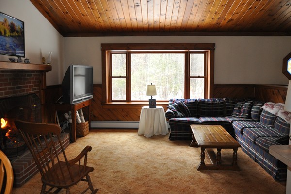 204 Fitchburg Road Townsend, MA 01469 - Photo 6 of 29 a living room with furniture and a flat screen tv