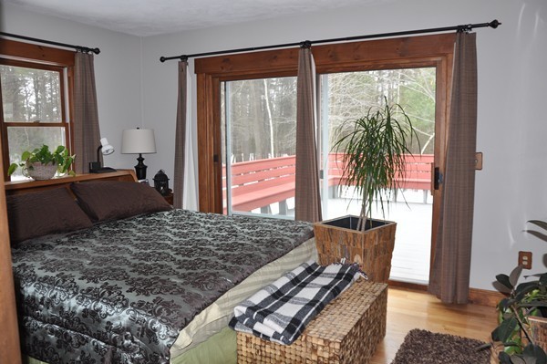 204 Fitchburg Road Townsend, MA 01469 - Photo 8 of 29 a bedroom with a bed and a window