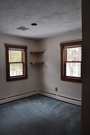 204 Fitchburg Road Townsend, MA 01469 - Photo 9 of 29 an empty room with a window