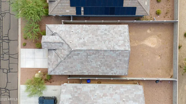 an aerial view of a city with lots of residential buildings