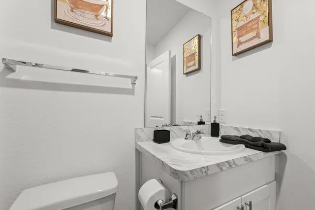 a bathroom with a sink and a toilet