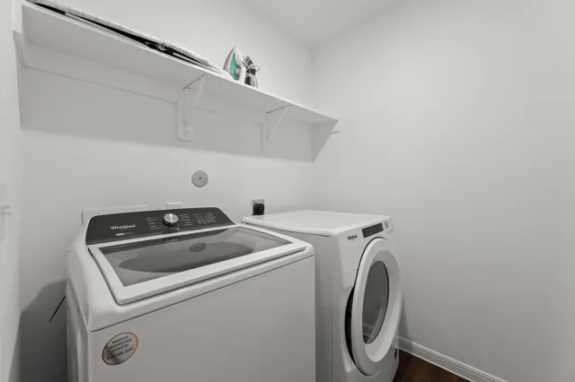 a utility room with dryer and washer