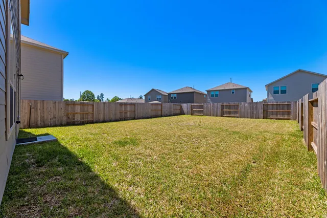 a house view with a garden space