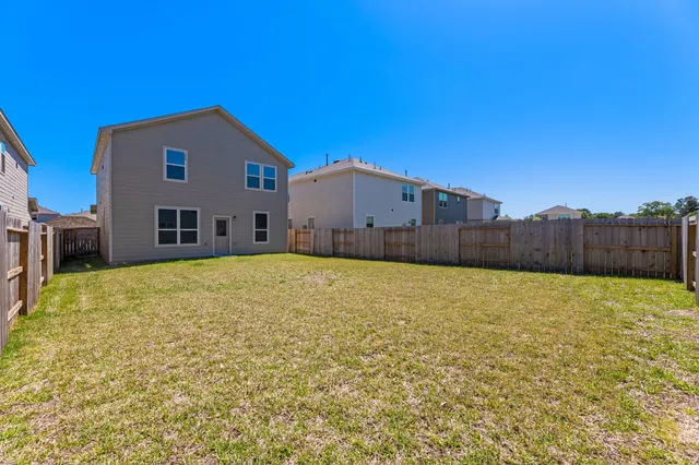 a bathroom with a sink and a yard