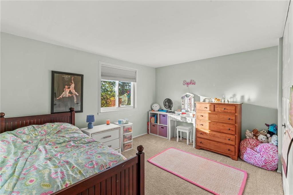 1256 Manor Drive Pittsburgh, PA 15241 - Photo 19 of 35 a bedroom with a bed and a window