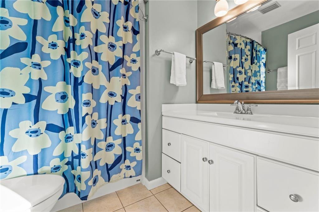 1256 Manor Drive Pittsburgh, PA 15241 - Photo 21 of 35 a bathroom with a sink and a mirror