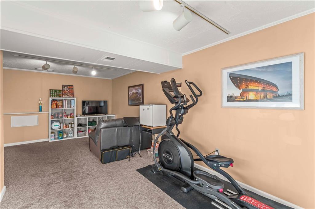 1256 Manor Drive Pittsburgh, PA 15241 - Photo 23 of 35 a view of a room with gym equipment