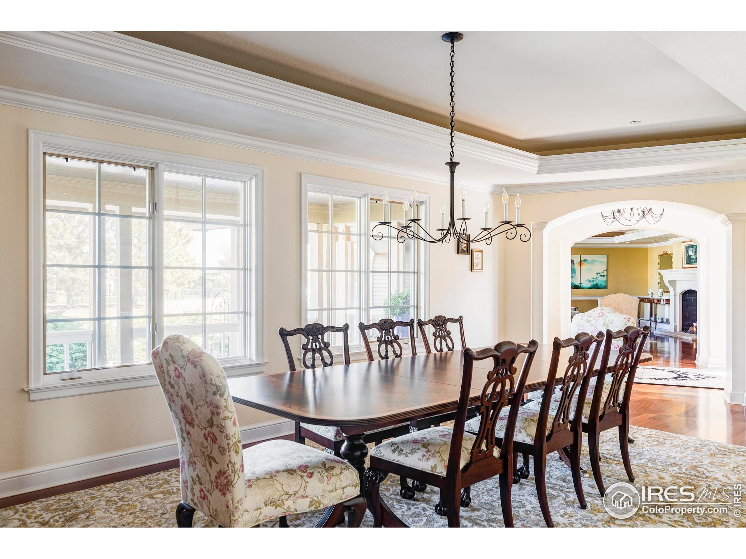 9402 Crystal Lane Longmont, CO 80503 - Photo 11 of 32 a view of a dining room with furniture window and outside view