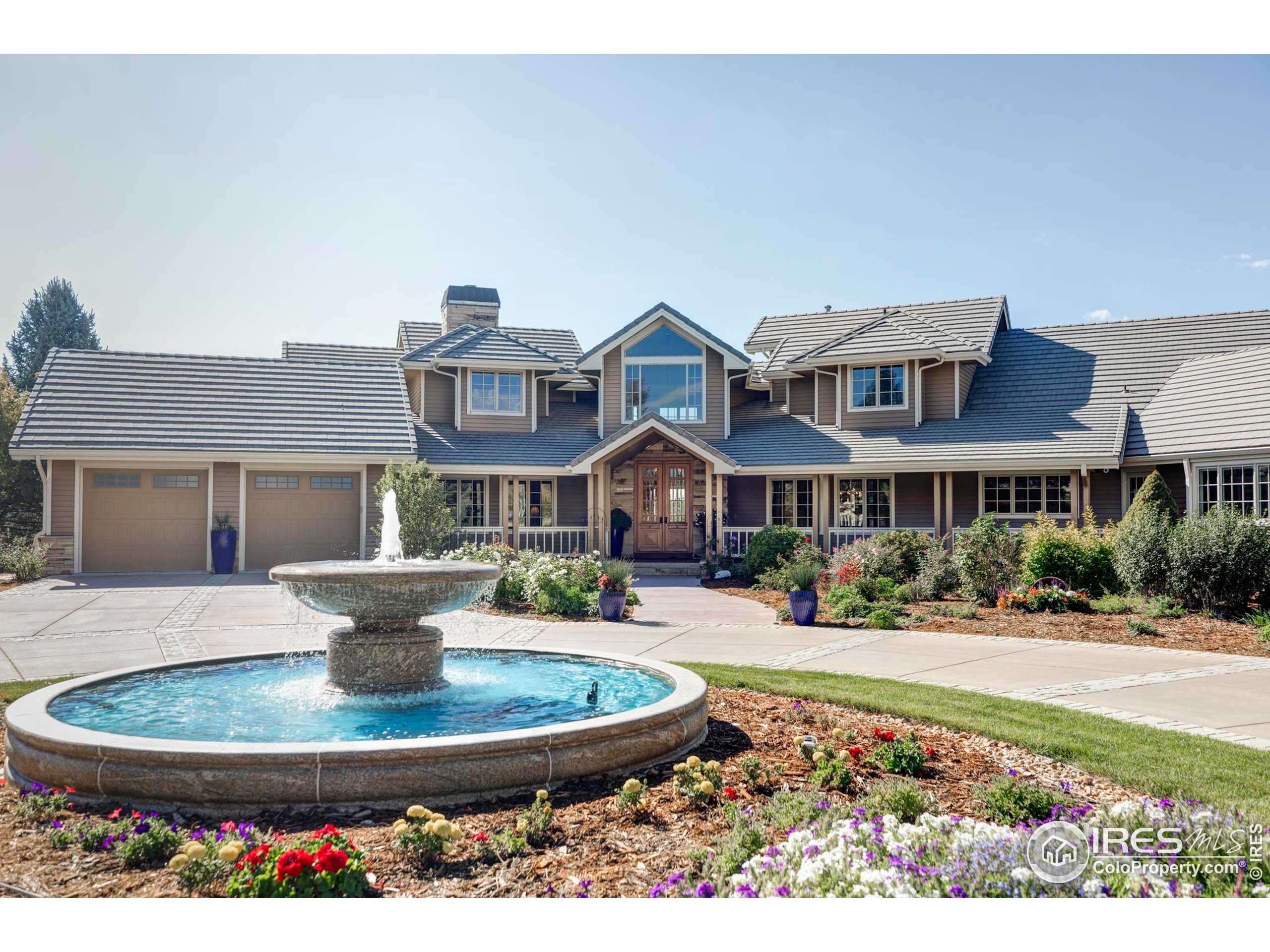 9402 Crystal Lane Longmont, CO 80503 - Photo 2 of 32 a front view of a house with a yard