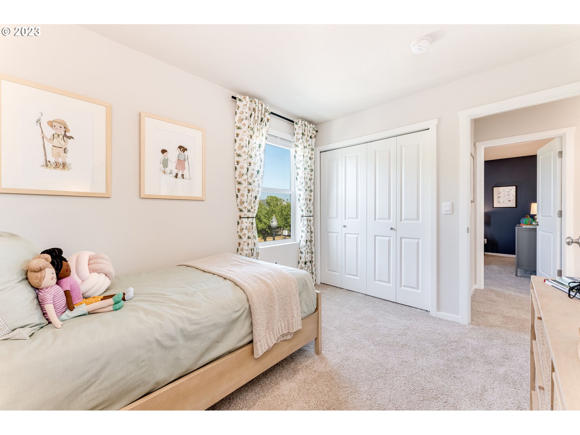 203 North Layla Place Ridgefield, WA 98642 - Photo 26 of 30 a bedroom with a bed and a window