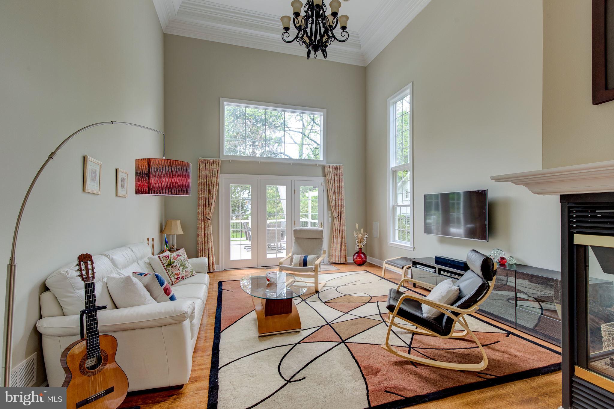 220 Old Lancaster Road Devon, PA 19333 - Photo 12 of 50 Family room sharing see thru fireplace