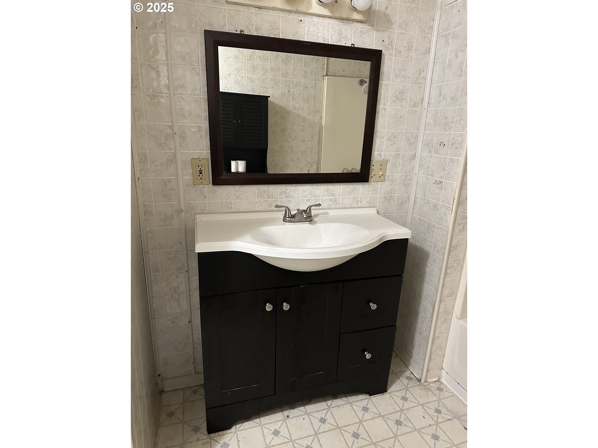 9247 Highway 126 Mapleton, OR 97453 - Photo 19 of 41 a bathroom with a sink and a mirror
