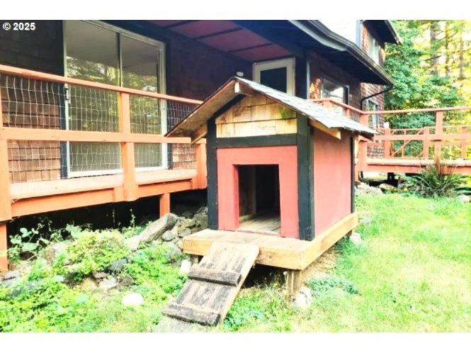 9247 Highway 126 Mapleton, OR 97453 - Photo 4 of 41 a front view of a house with a yard