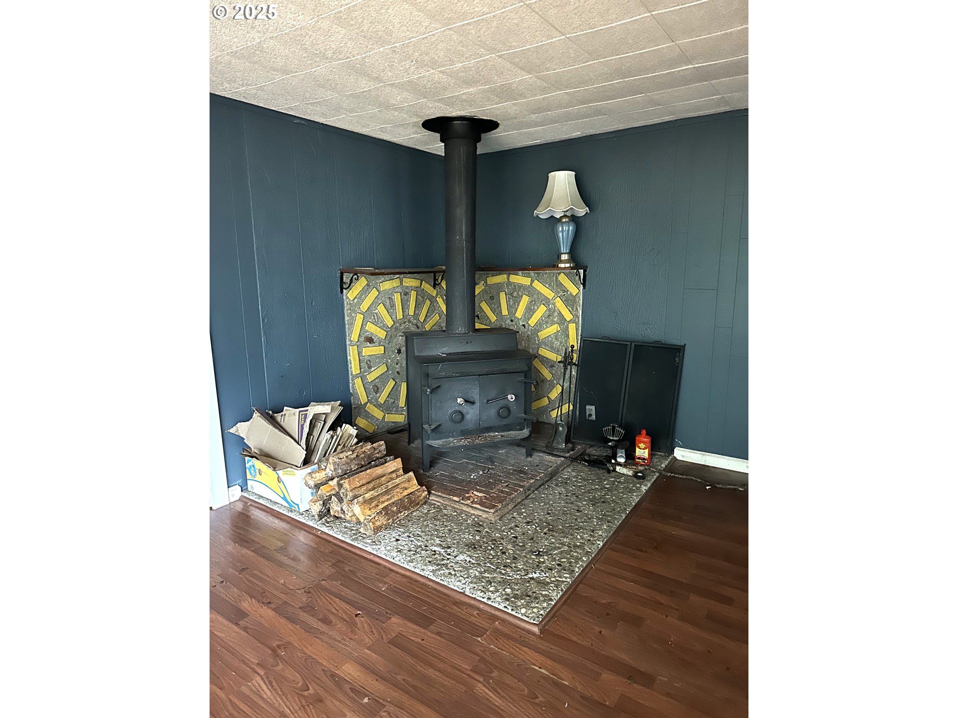 9247 Highway 126 Mapleton, OR 97453 - Photo 7 of 41 a living room with furniture and a wooden floor
