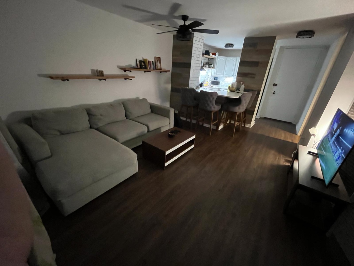 2605 South Indiana Avenue, Unit 606 Chicago, IL 60616 - Photo 14 of 34 a living room with furniture and a wooden floor