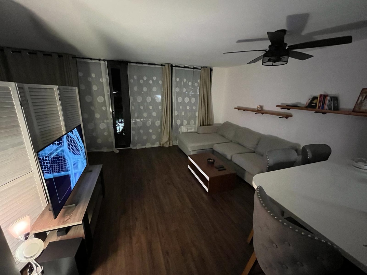 2605 South Indiana Avenue, Unit 606 Chicago, IL 60616 - Photo 17 of 34 a living room with furniture and a wooden floor