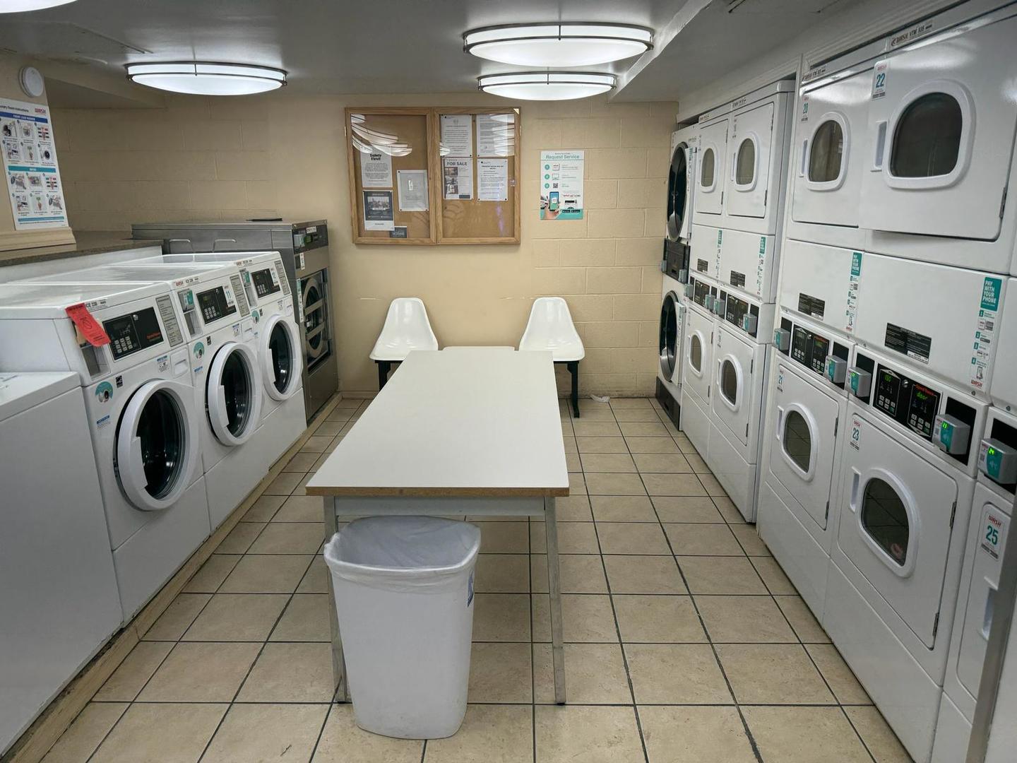 2605 South Indiana Avenue, Unit 606 Chicago, IL 60616 - Photo 19 of 34 a utility room with dryer and washer