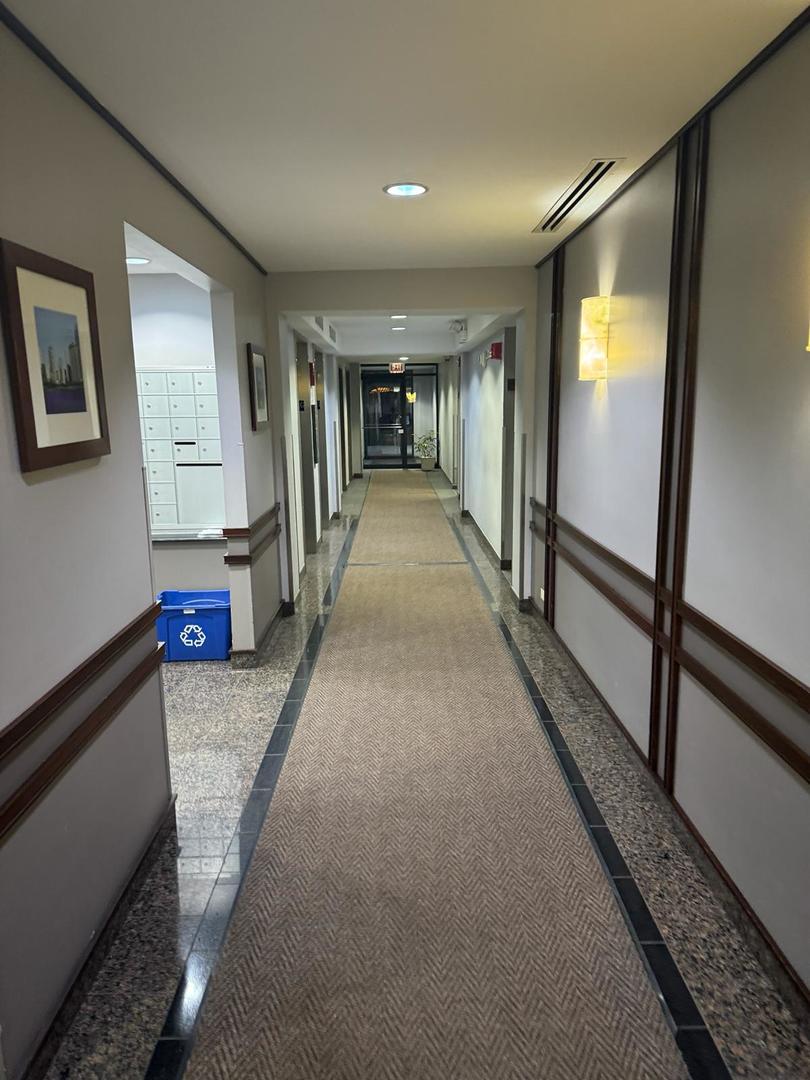 2605 South Indiana Avenue, Unit 606 Chicago, IL 60616 - Photo 21 of 34 a view of hallway with stairs