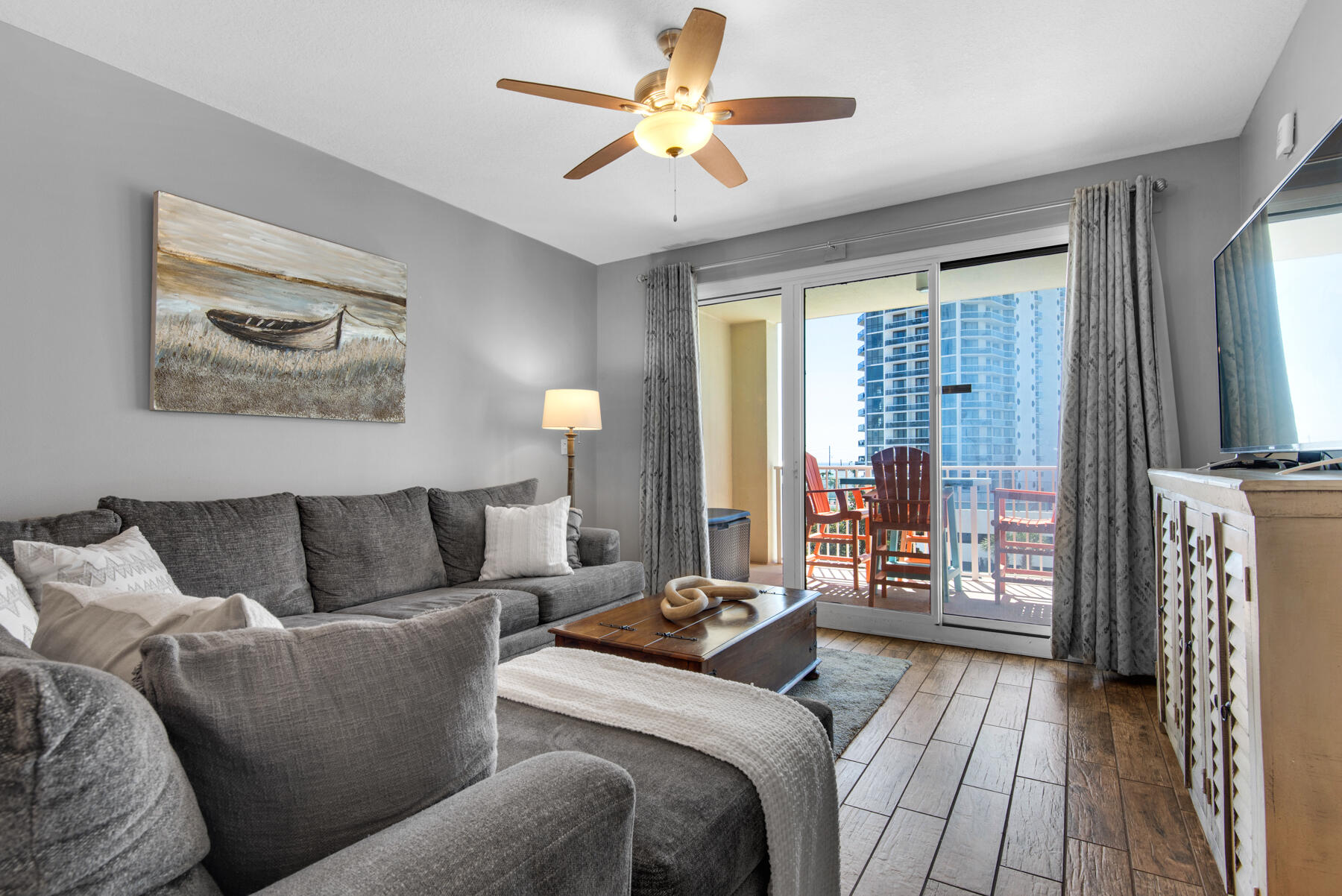 112 Seascape Drive, Unit 402 Miramar Beach, FL 32550 - Photo 11 of 31 a living room with furniture and a fireplace