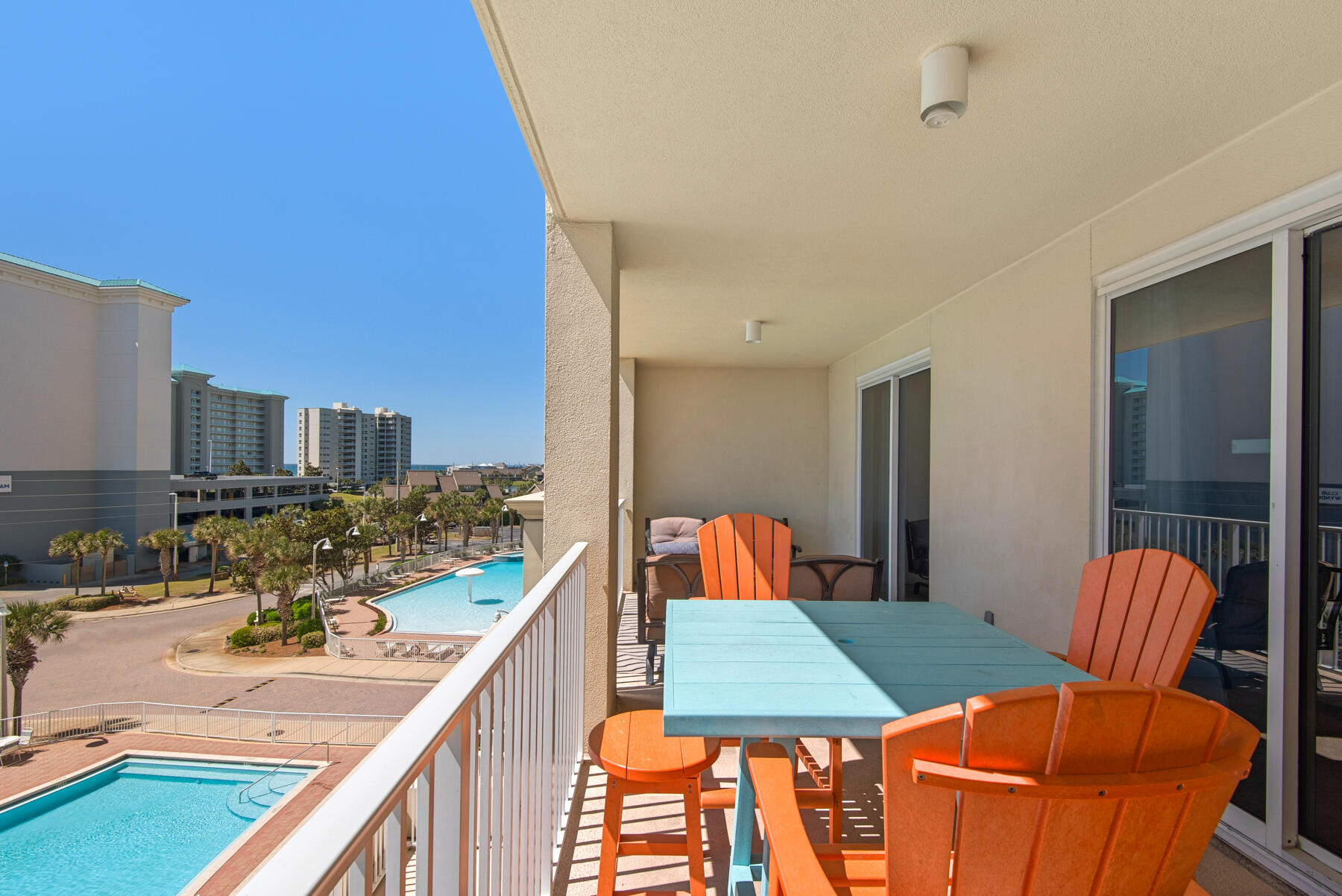 112 Seascape Drive, Unit 402 Miramar Beach, FL 32550 - Photo 26 of 31 a kitchen view with chairs and wooden floor