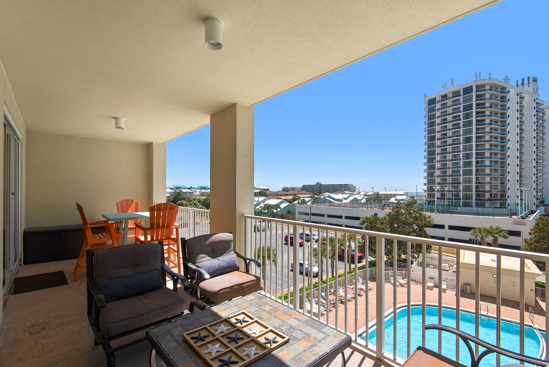 112 Seascape Drive, Unit 402 Miramar Beach, FL 32550 - Photo 27 of 31 a balcony with furniture and city view