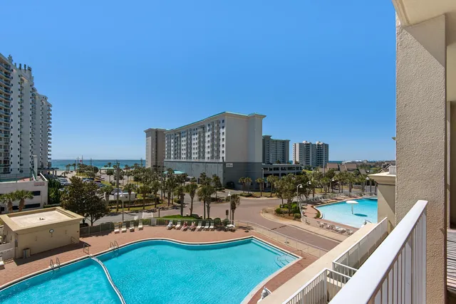 a view of a kitchen with swimming pool and sitting area