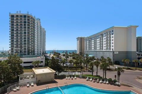 a front view of a building with outdoor space