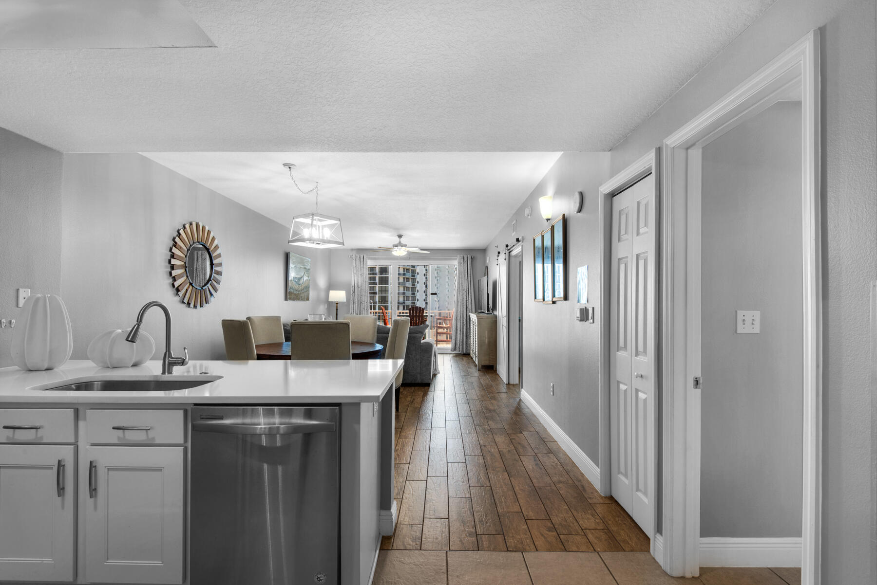 112 Seascape Drive, Unit 402 Miramar Beach, FL 32550 - Photo 5 of 31 a view of a kitchen from the hallway