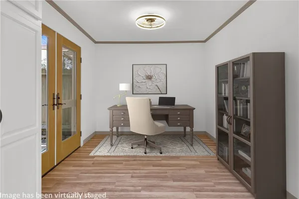 a view of a livingroom with furniture and furniture