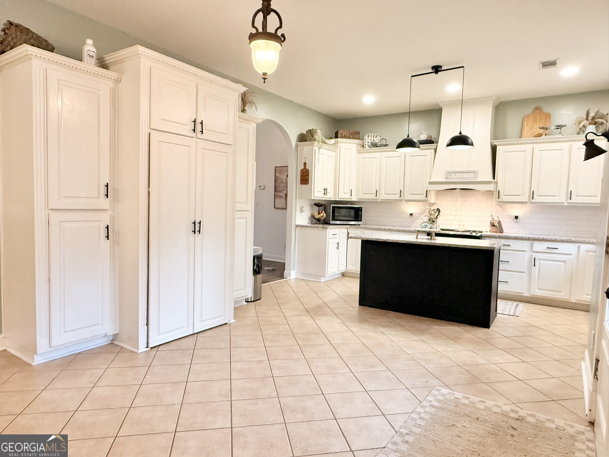 919 West Milner Road Concord, GA 30206 - Photo 17 of 40 a kitchen with stainless steel appliances granite countertop a refrigerator and a sink