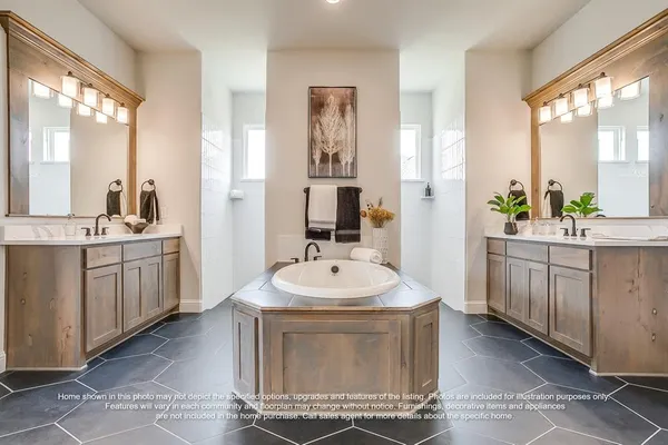 a bathroom with a sink double vanity and a mirror