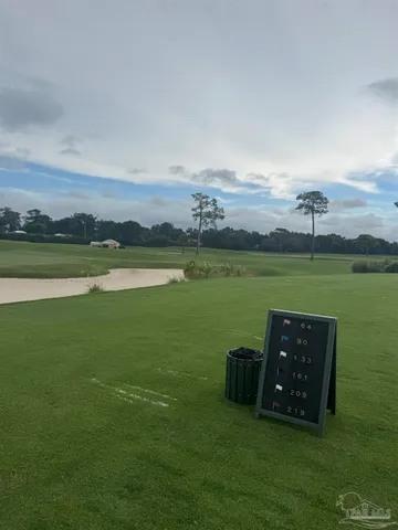 a view of a lake with a big yard