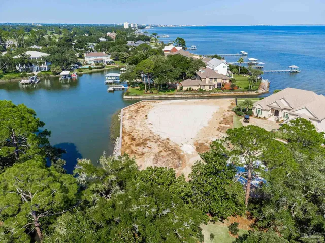 an aerial view of a houses with outdoor space