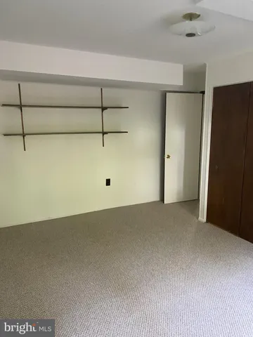 a view of a room with an empty space