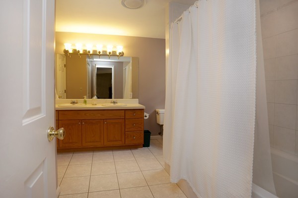 5 Silverbrook Road Boxford, MA 01921 - Photo 21 of 29 a bathroom with a sink vanity and mirror
