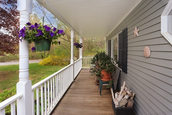 5 Silverbrook Road Boxford, MA 01921 - Photo 3 of 29 a view of a porch and flowers