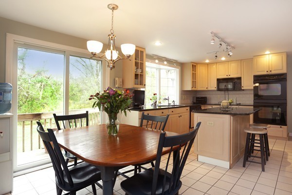 5 Silverbrook Road Boxford, MA 01921 - Photo 5 of 29 a dining room filled chandelier and kitchen view