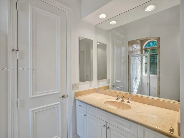 a kitchen with stainless steel appliances granite countertop a stove and a refrigerator