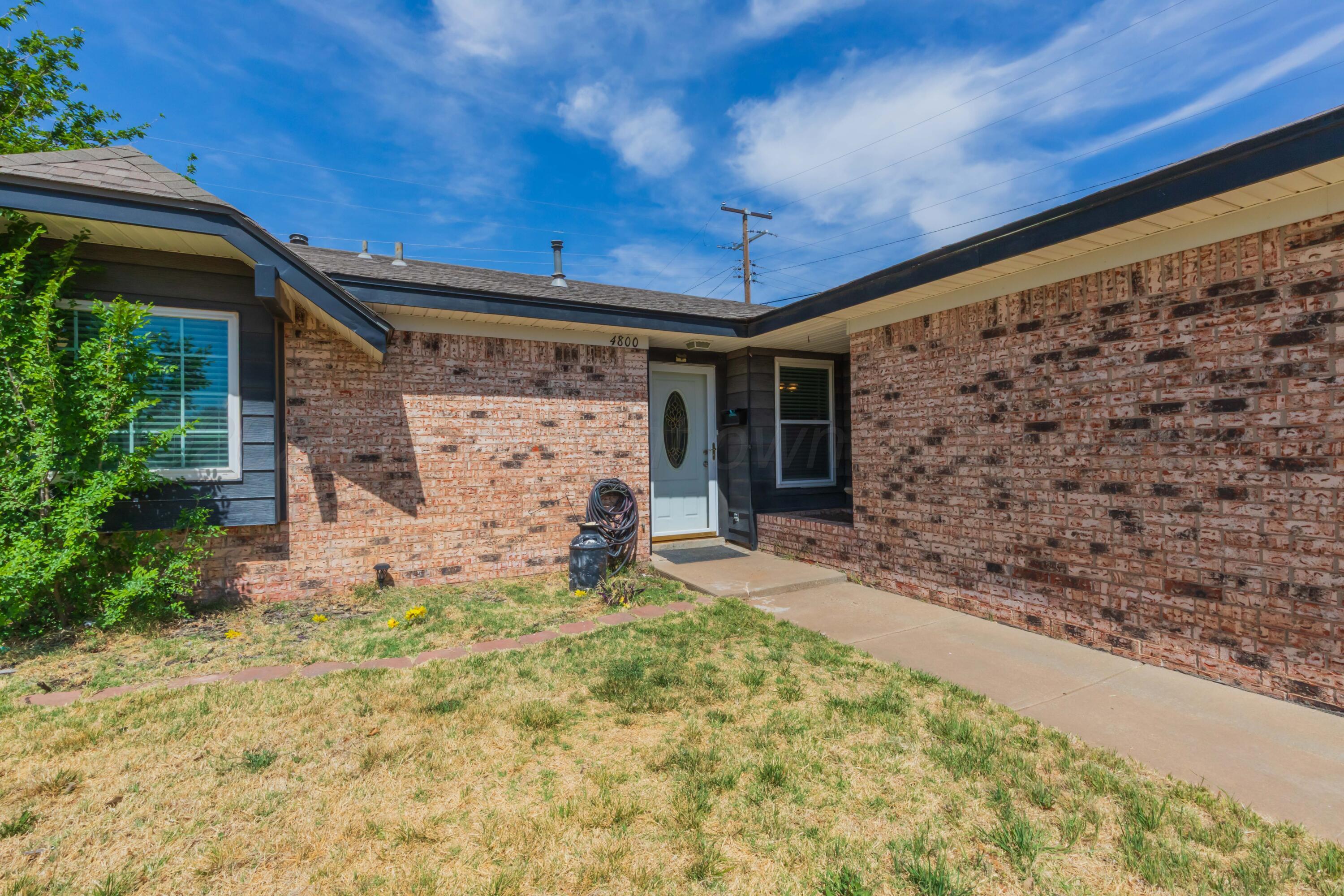 4800 South Austin Street Amarillo, TX 79110 - Photo 4 of 29 a view of a backyard of the house