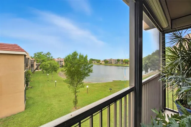 a view of a garden from a balcony