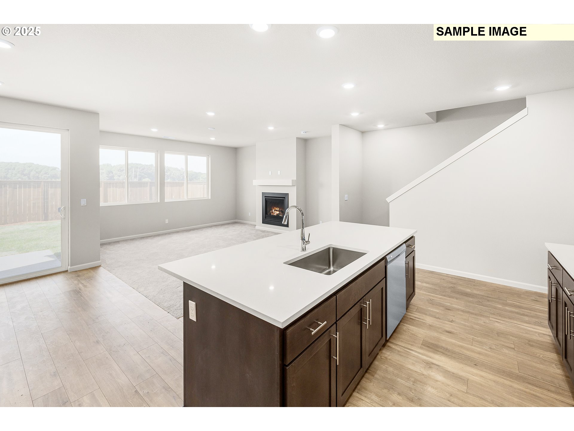 1472 Southeast Logan Parkway Albany, OR 97322 - Photo 8 of 23 a kitchen that has a sink and a wooden floor