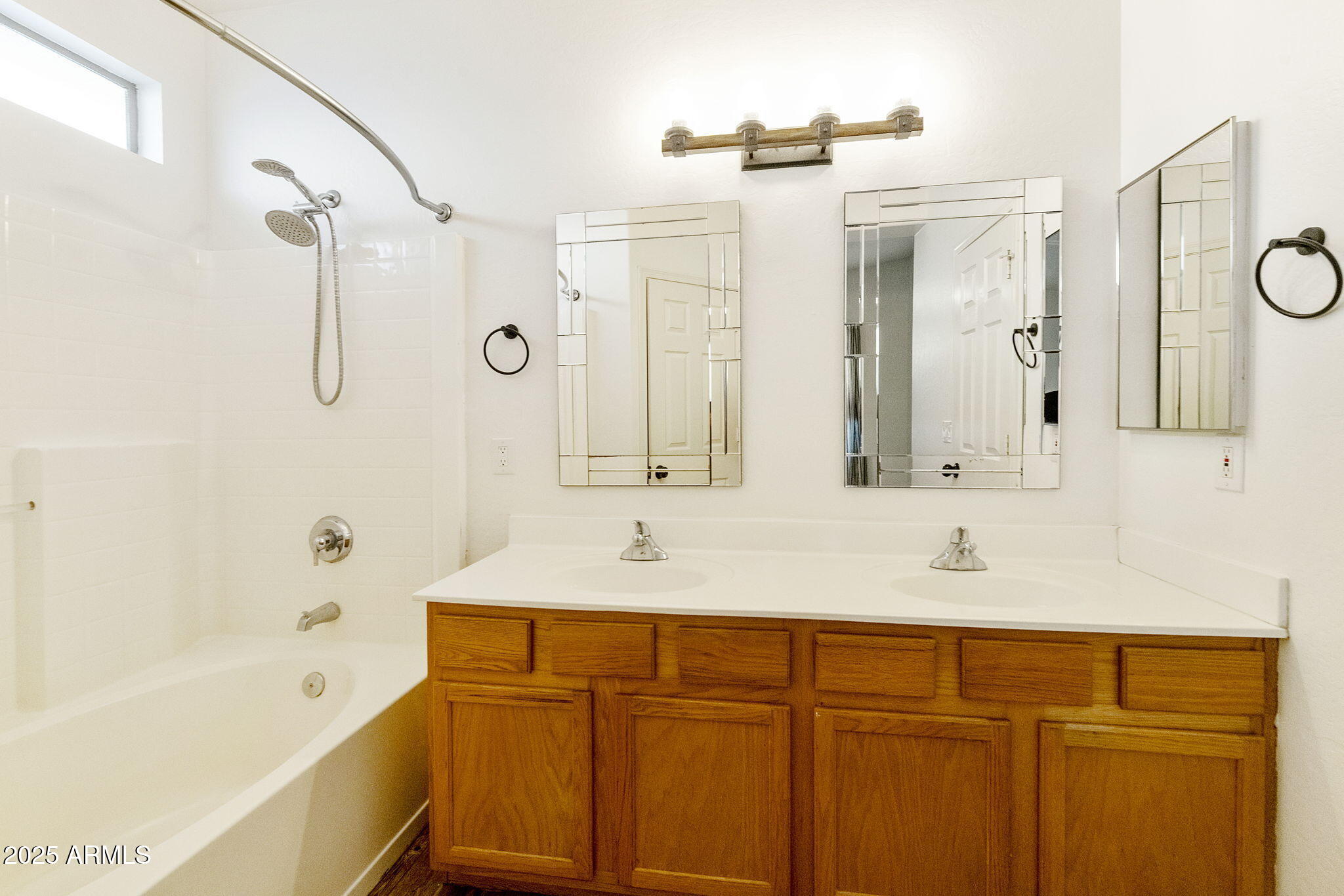 2129 South Compton Mesa, AZ 85209 - Photo 12 of 28 a bathroom with a tub sink and mirror