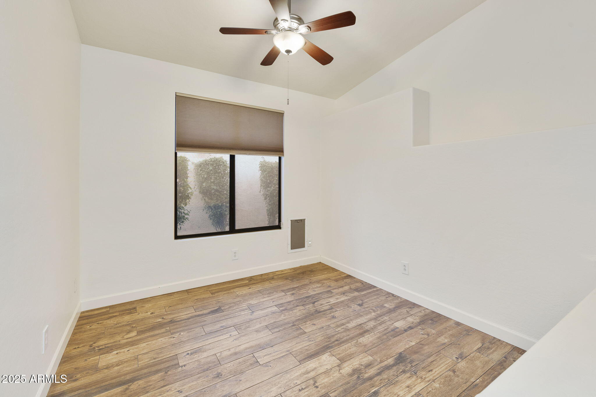 2129 South Compton Mesa, AZ 85209 - Photo 16 of 28 a view of empty room with wooden floor