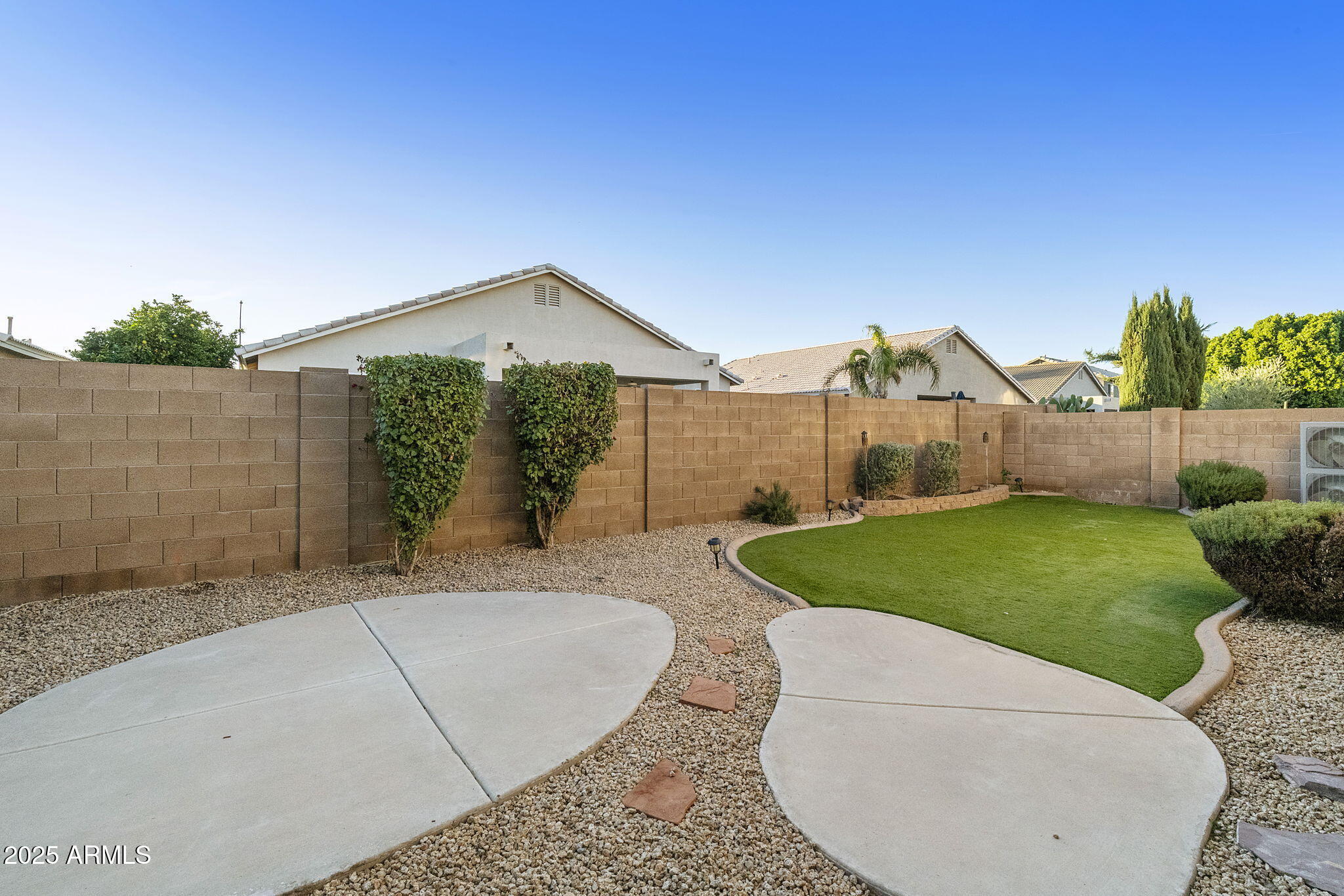 2129 South Compton Mesa, AZ 85209 - Photo 19 of 28 a view of a house with a tub and a yard