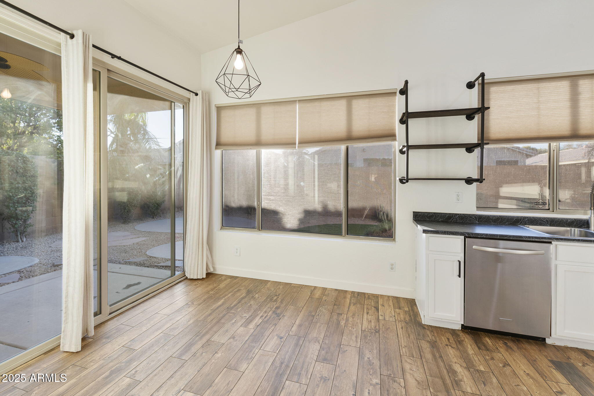 2129 South Compton Mesa, AZ 85209 - Photo 5 of 28 a bathroom with a glass door shower and sink