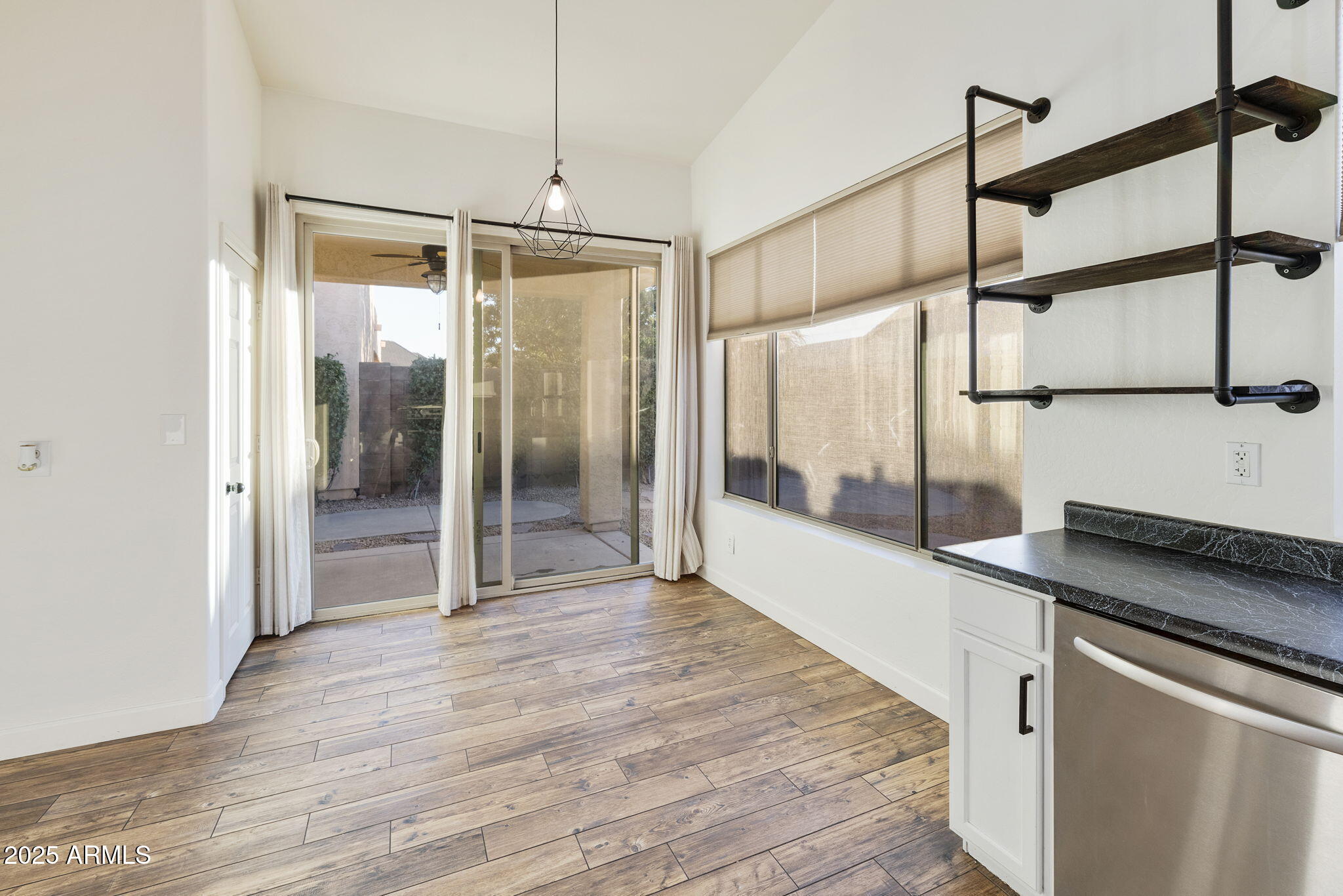 2129 South Compton Mesa, AZ 85209 - Photo 8 of 28 a kitchen with stainless steel appliances granite countertop a refrigerator and a sink