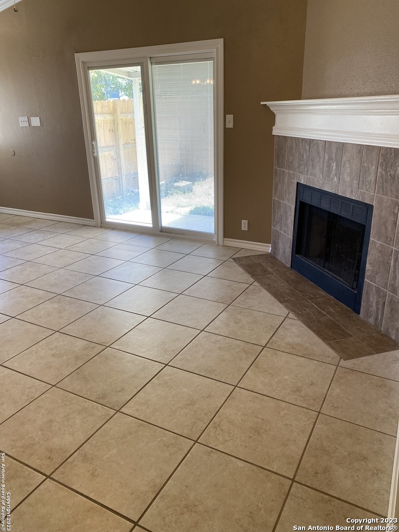 8406 Forest Ridge Drive San Antonio, TX 78239 - Photo 12 of 23 a view of a livingroom with a fireplace