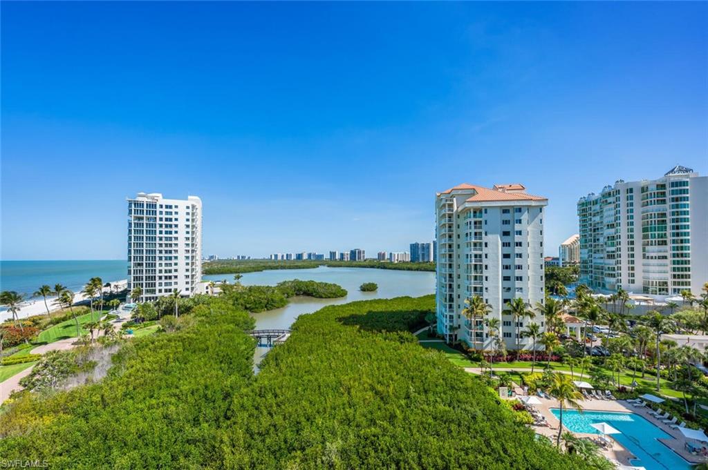 20 Seagate Drive, Unit 803 Naples, FL 34103 - Photo 38 of 44 a view of a city with tall buildings